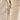 A close up of the front zipped pocket of an ecru beige fabric drink bottle carrier by GoSip.