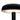 A close up of the LED lighting section below a dome-shaped shade of a black wireless table lamp. The light is on and glowing with warm light. Photographed against a plain white background.