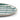 A close up of an oval melamine & bamboo serving platter with a green and white striped pattern shown on a clean white background.