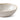 A close up of a small beige dip bowl photographed on a white background.