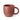 A matte terracotta coloured ceramic mug with a braided handle, shown on a clean white background.