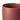 A closeup of the top edge of matte terracotta coloured ceramic mug with a braided handle, shown on a clean white background.