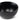 A black stoneware cereal bowl with a vertical ribbed texture on the outside, shown from an angle above on a clean white background.