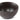 A dark brown stoneware cereal bowl with a vertical ribbed texture on the outside, shown from an angle above on a clean white background.